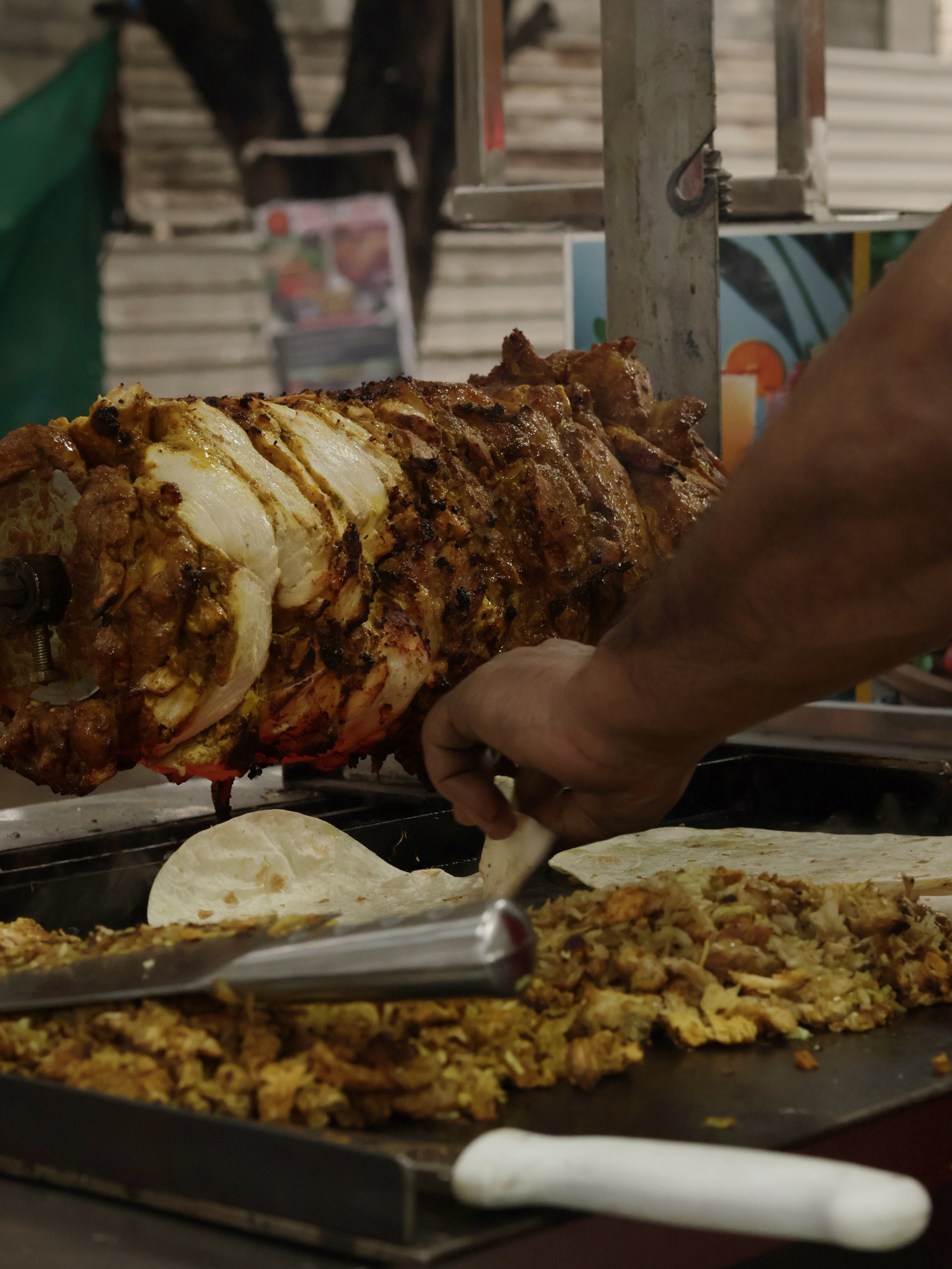 Freshly Shaved Chicken Shawarma meat prep at Al-Taiba